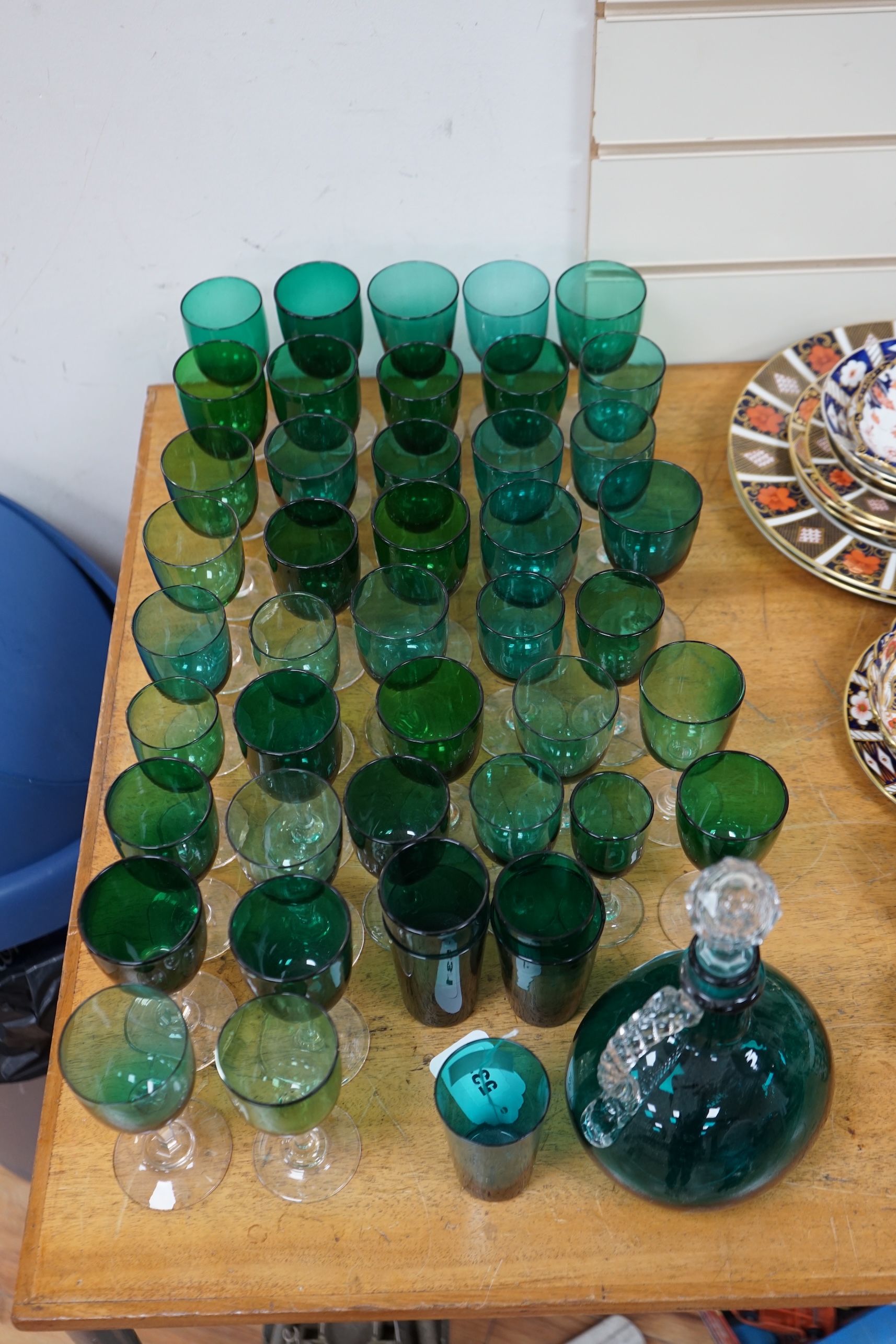 A collection of Victorian green glassware including a claret jug, 24cm. Condition - mostly good